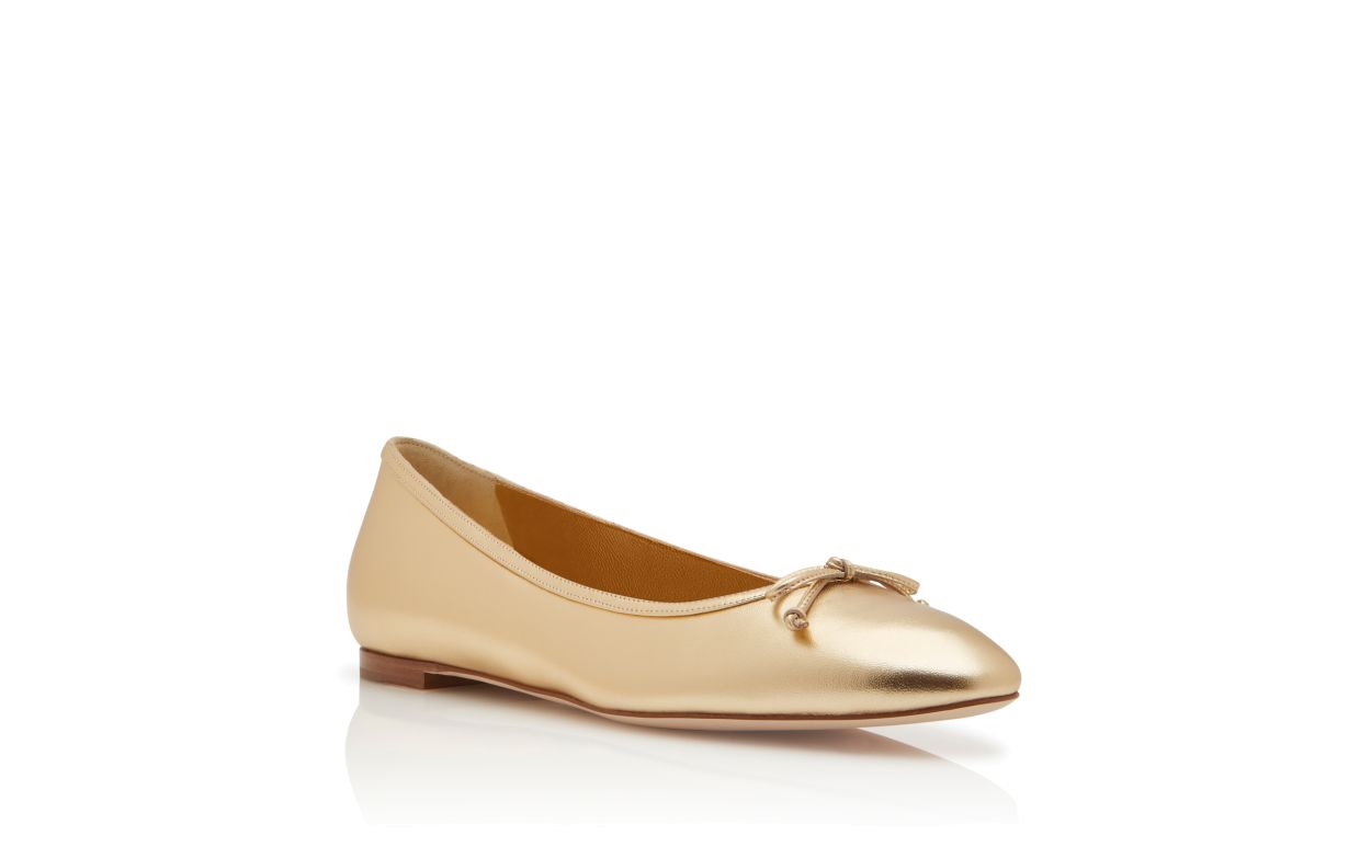 Zapatillas planas de cuero napa dorado