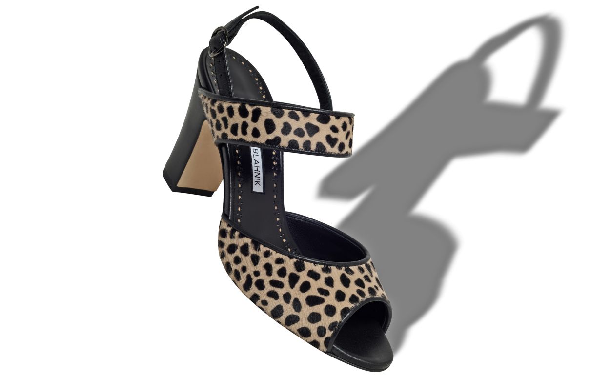 Zapatillas de tiras con pelo de ternera estampado animal