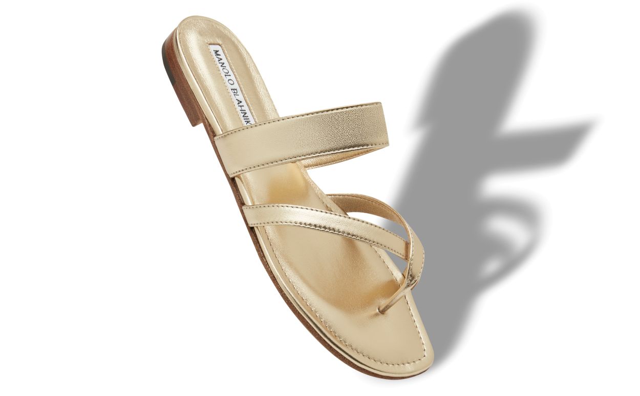 Sandalias planas de cuero napa dorado