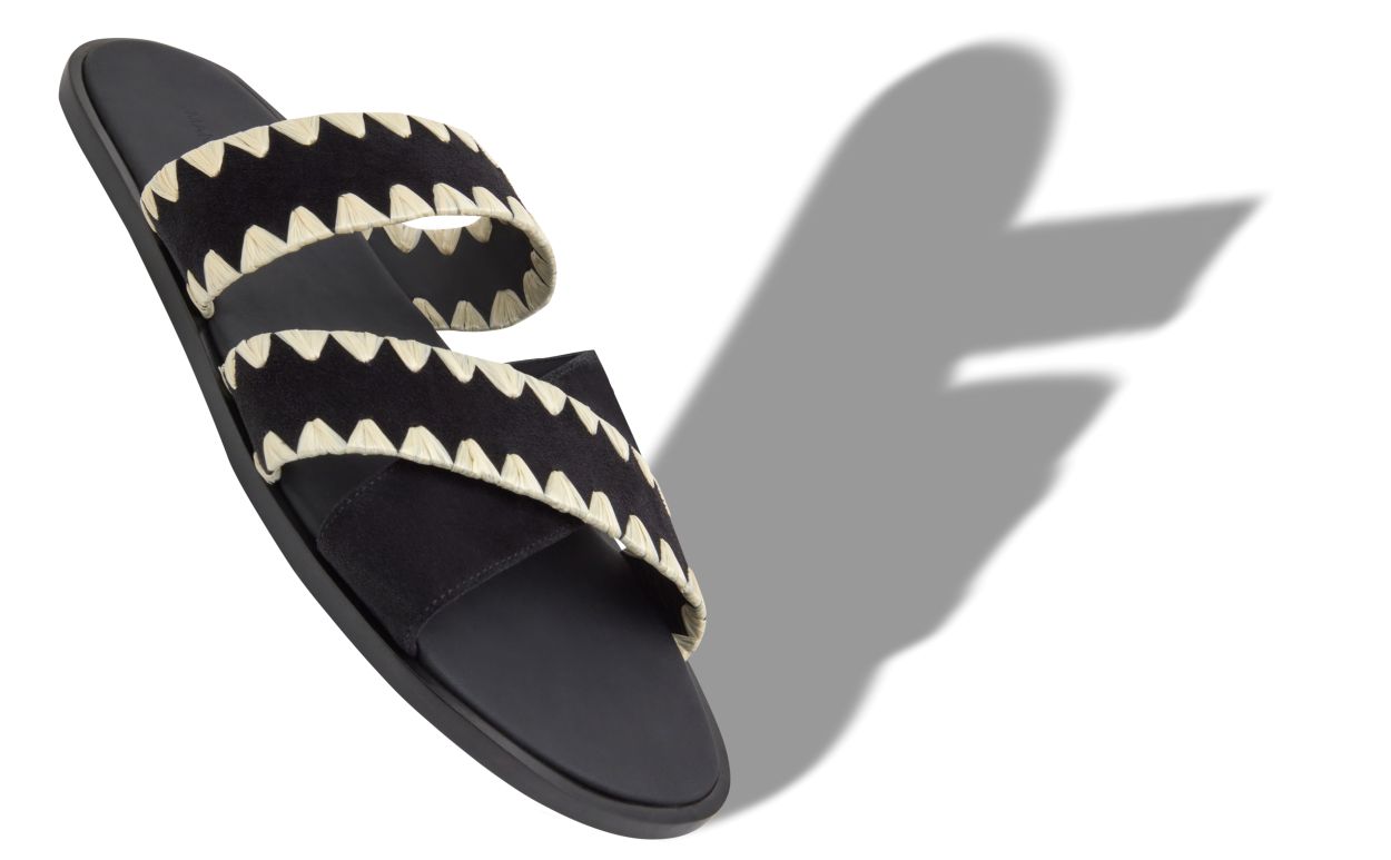 Sandalias planas de ante negro con puntada de manta